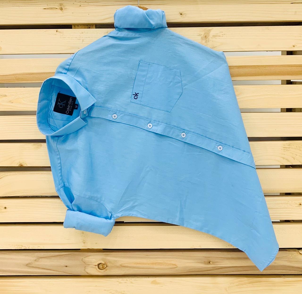 Calvin Kevin Plain Shirt – Sky Blue Calvin Kevin sky blue plain men's shirt with hard collar, full sleeves and embroidered logo.