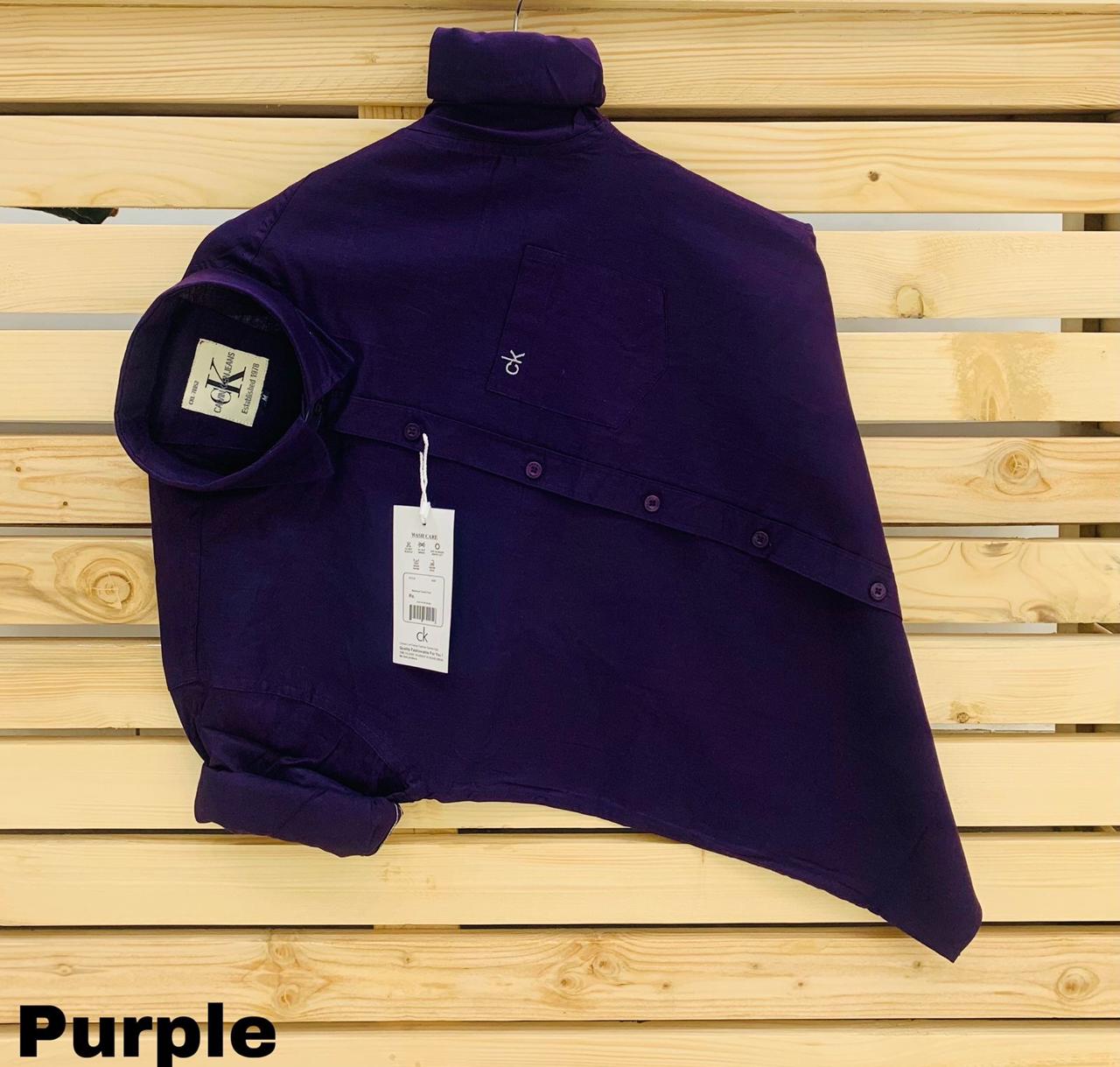 Calvin Kevin Plain Shirt – Purple Calvin Kevin purple plain men's shirt with hard collar, full sleeves and embroidered logo.