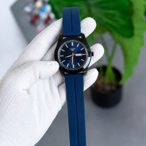 Tissot watch with navy blue dial and matching blue strap