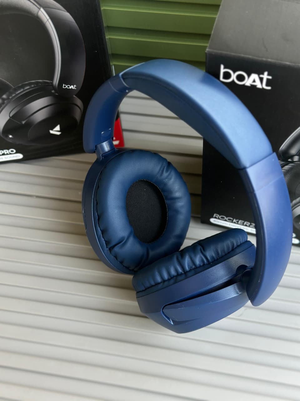 boAt Rockerz 650 Pro Wireless Headphones boAt Rockerz 650 Pro black wireless over-ear headphones displayed on a minimalist stone pedestal