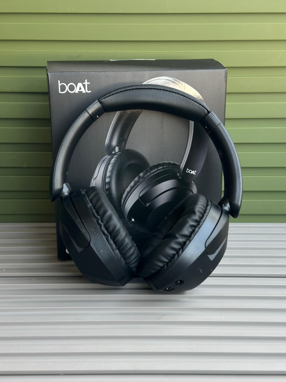 boAt Rockerz 650 Pro Wireless Headphones boAt Rockerz 650 Pro black wireless over-ear headphones displayed on a minimalist stone pedestal