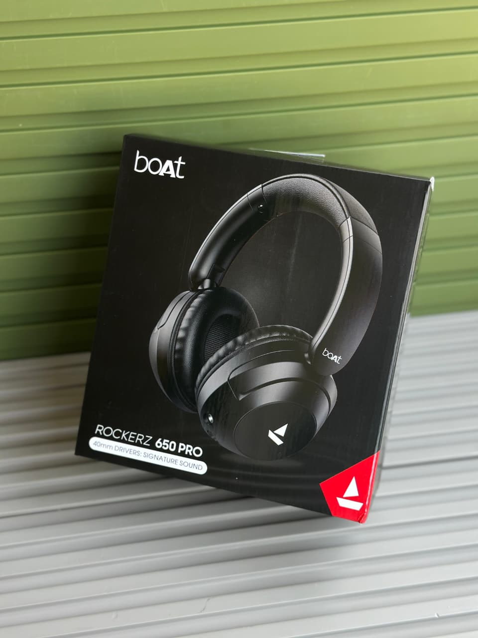 boAt Rockerz 650 Pro Wireless Headphones boAt Rockerz 650 Pro black wireless over-ear headphones displayed on a minimalist stone pedestal