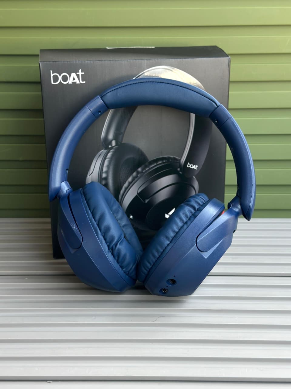 boAt Rockerz 650 Pro Wireless Headphones boAt Rockerz 650 Pro black wireless over-ear headphones displayed on a minimalist stone pedestal