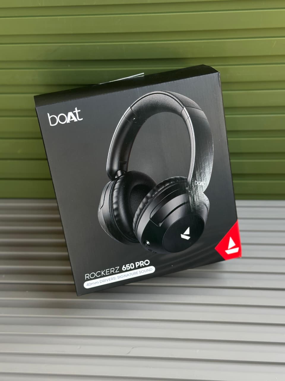 boAt Rockerz 650 Pro Wireless Headphones boAt Rockerz 650 Pro black wireless over-ear headphones displayed on a minimalist stone pedestal