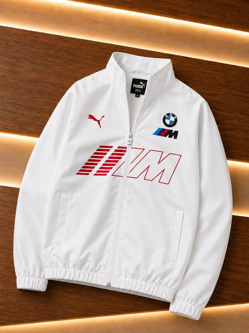 White BMW M Motorsport Jacket White BMW M Motorsport jacket with red Puma logo, BMW badge and red M Motorsport graphic