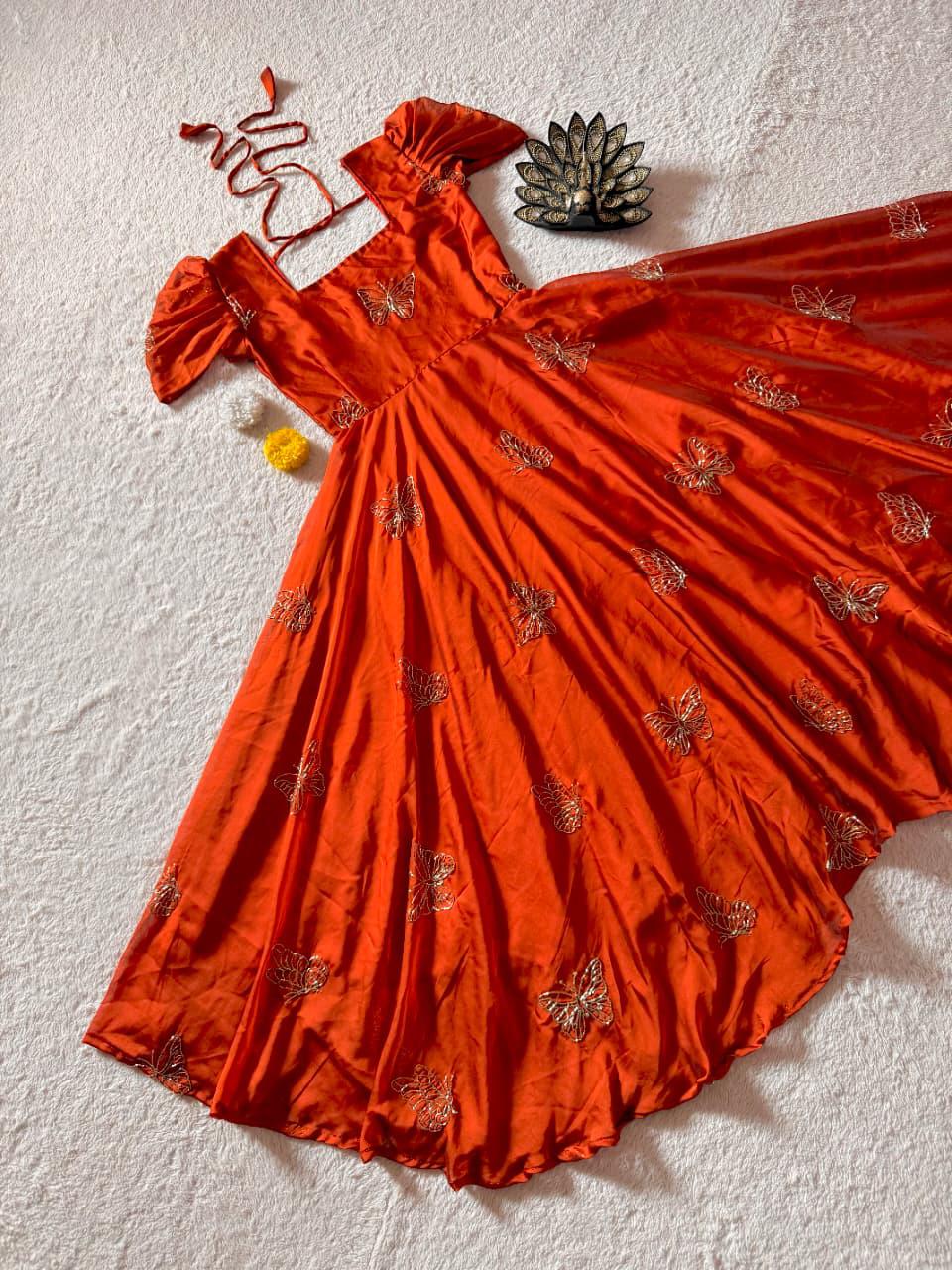 Rust Orange Rangoli Silk Designer Gown Rust orange Rangoli Silk gown with beads and sequin work