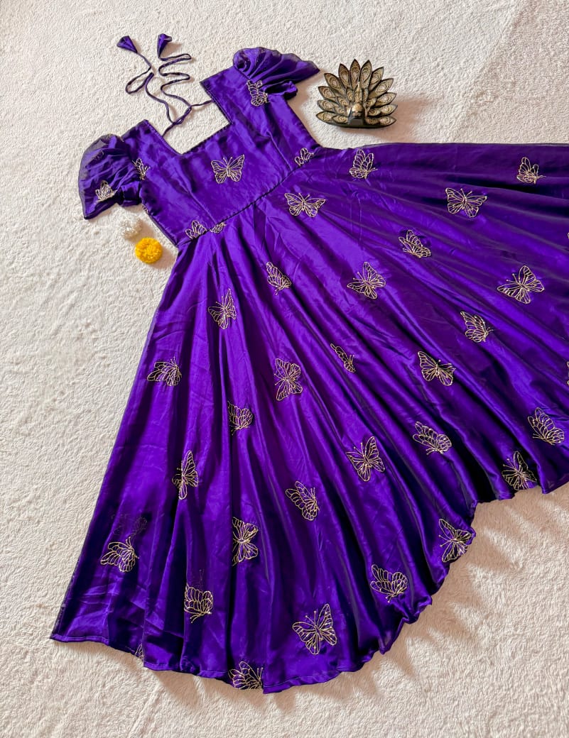 Deep Purple Rangoli Silk Gown Deep purple Rangoli Silk gown with fancy beads and sequin work
