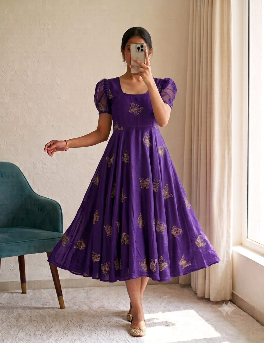 Deep Purple Rangoli Silk Gown Deep purple Rangoli Silk gown with fancy beads and sequin work